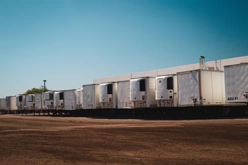 Representative refrigerated trailers at a carrier yard